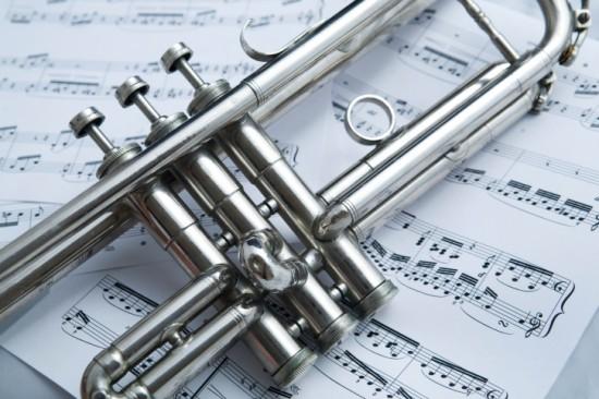 Trumpet on top of sheet music